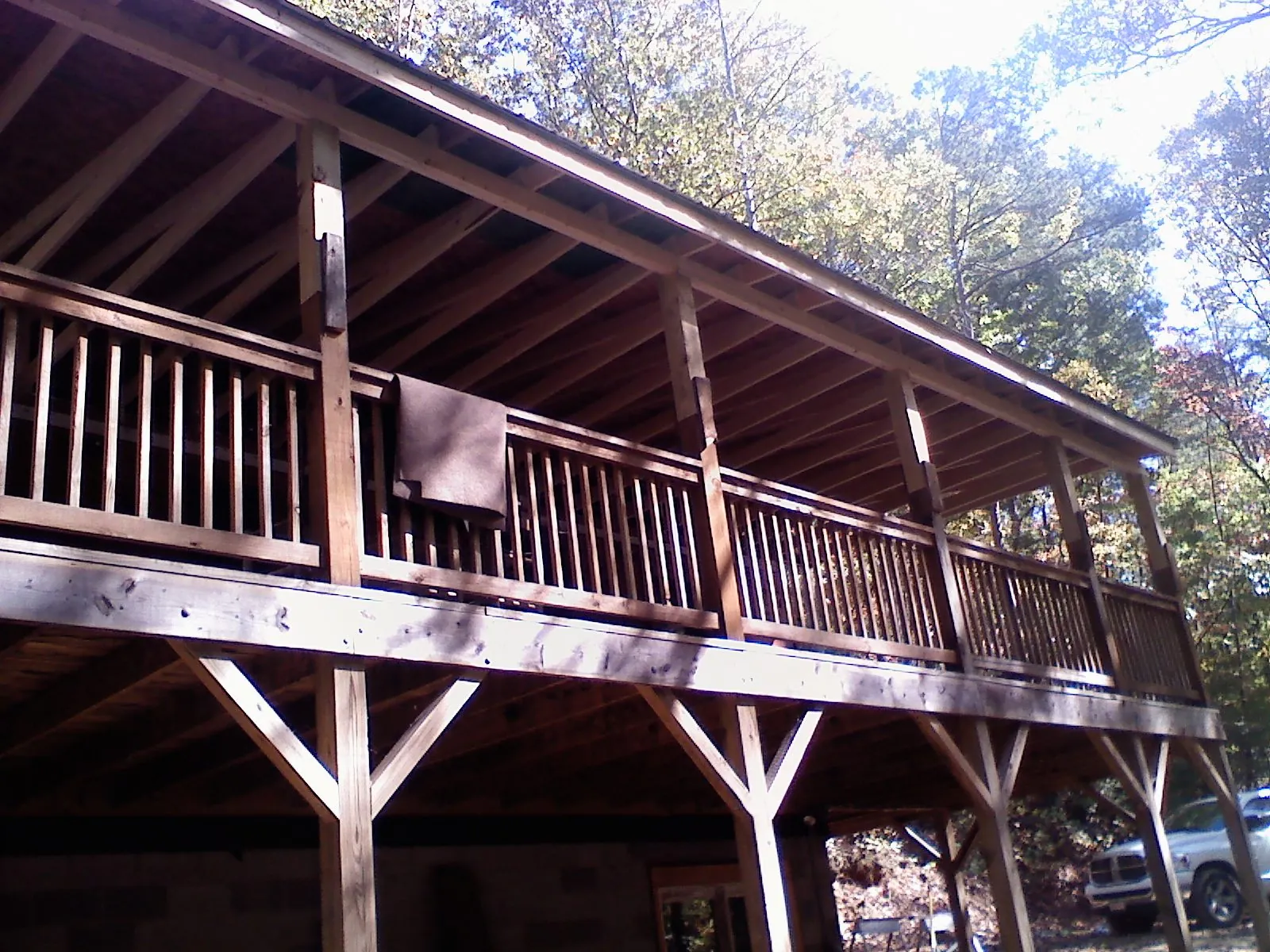 Timber framing under a new elevated porch and deck — Roof Leak Repair in Centereach by Roofing Brothers